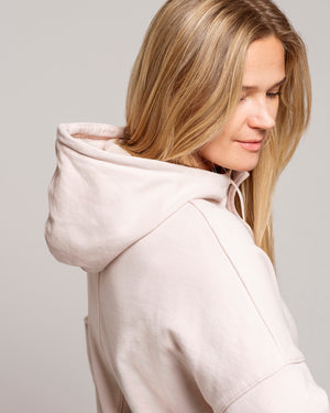 Organic cotton oversized hoodie made from super soft 100 organic cotton french terry fabric. Choose from our heavyweight black hoodie or the delicate hushed violet color. Designed as a high neck sweatshirt with a half zipper makes it the perfect, versatile organic cotton oversized hoodie. GOTS and OEKO-TEX certified.